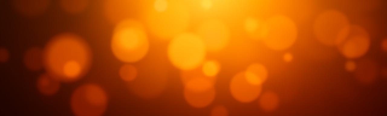 Abstract pattern of soft, warm light and shadow, creating beautiful bokeh effects.